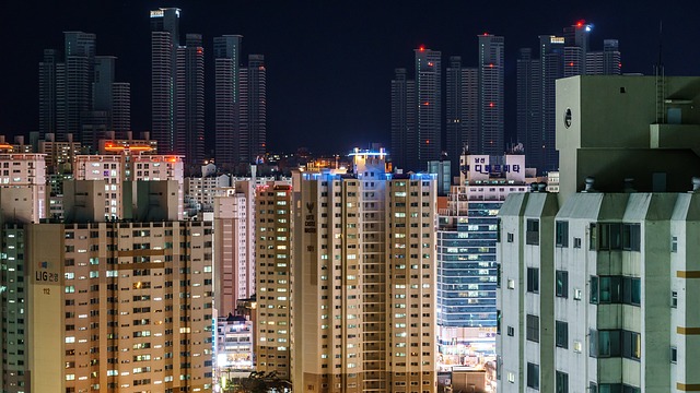 night view of block of apartments and condo