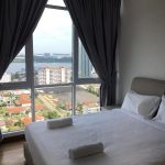 condo just 1 minutes to ciq - room with bed beside big windows